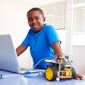 boy studying robotics
