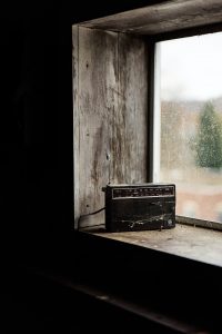 Small radio on windowsill