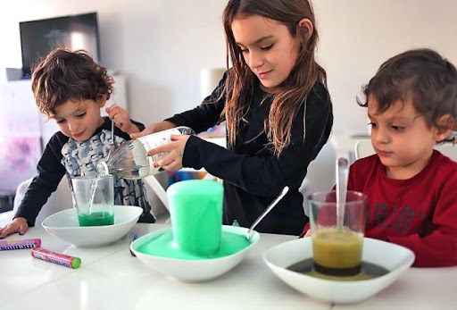 Kids doing a science experiment