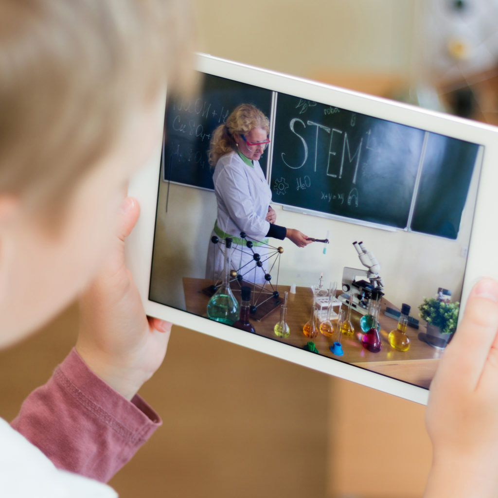 Person learning science on iPad